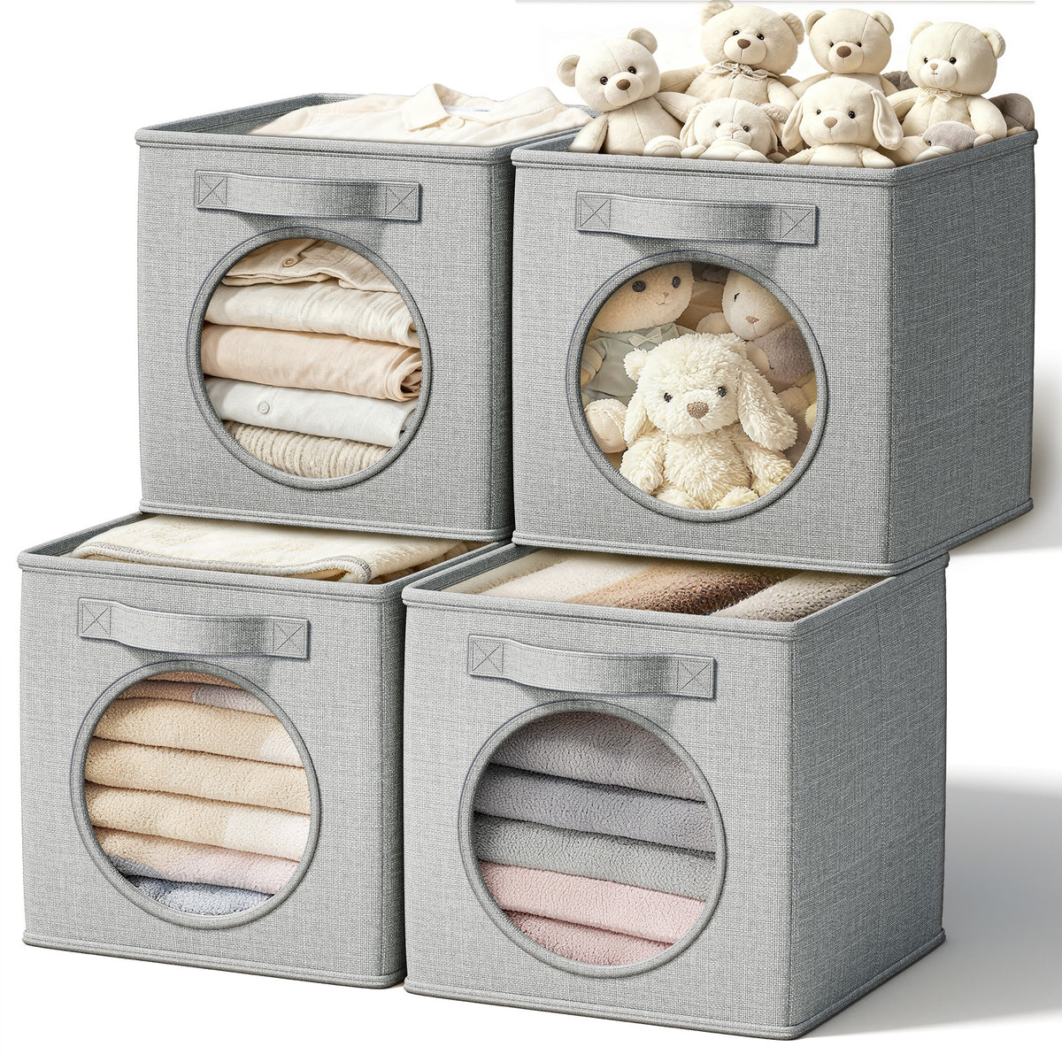 Four light grey linen storage cubes with round windows and handles