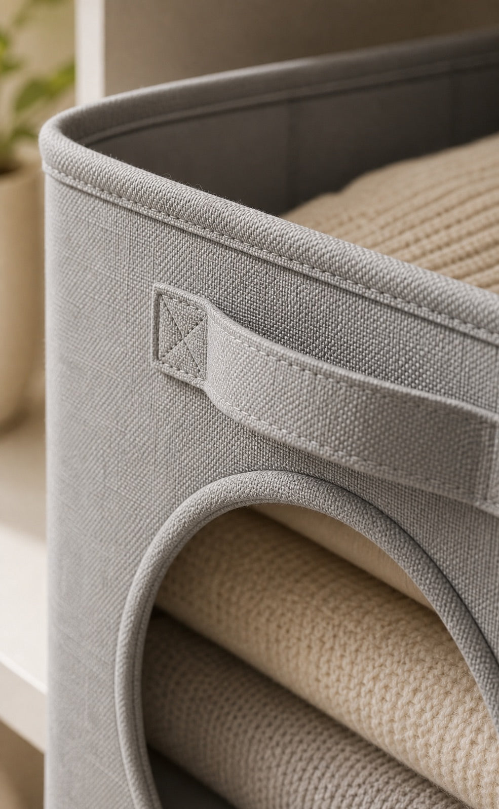 Close-up of textured cotton-linen fabric and structured shoe organizer edge